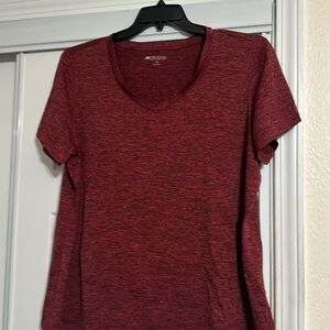 Red and black short sleeve shirt with red stitching on sides and bottom
